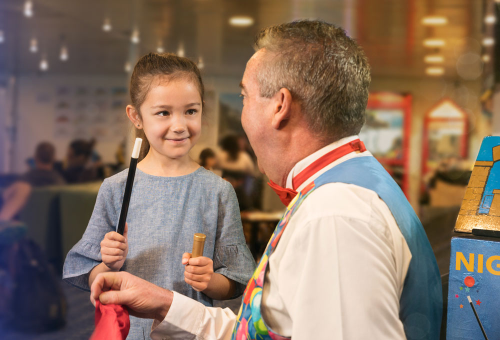 Girl watching magic show