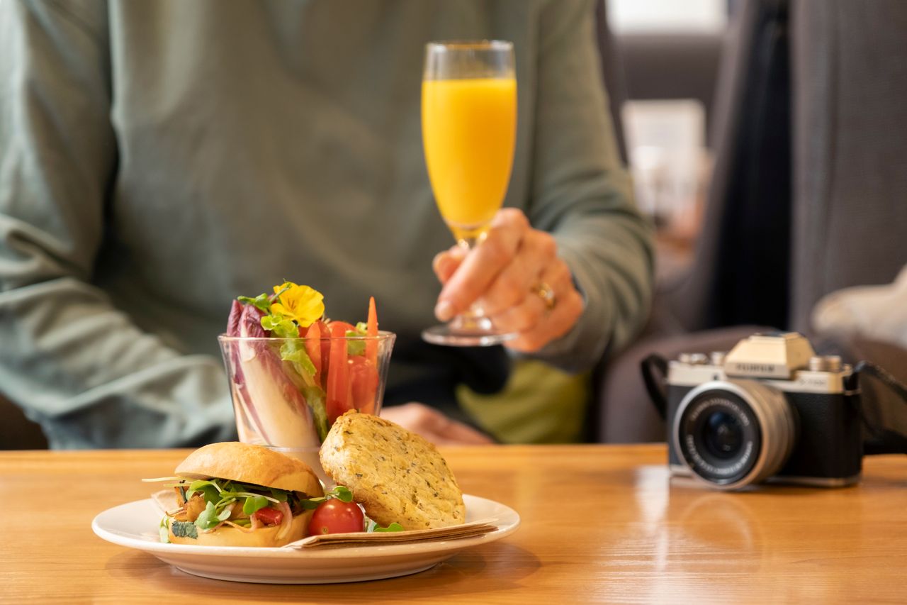 Plate of food and glass of juice