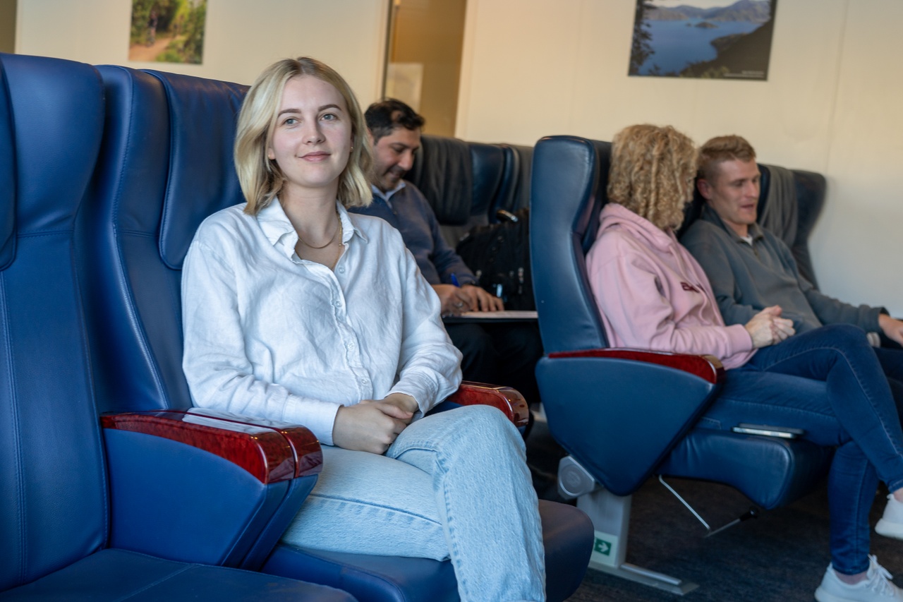 woman takes in the view from Queen Charlotte Lounge